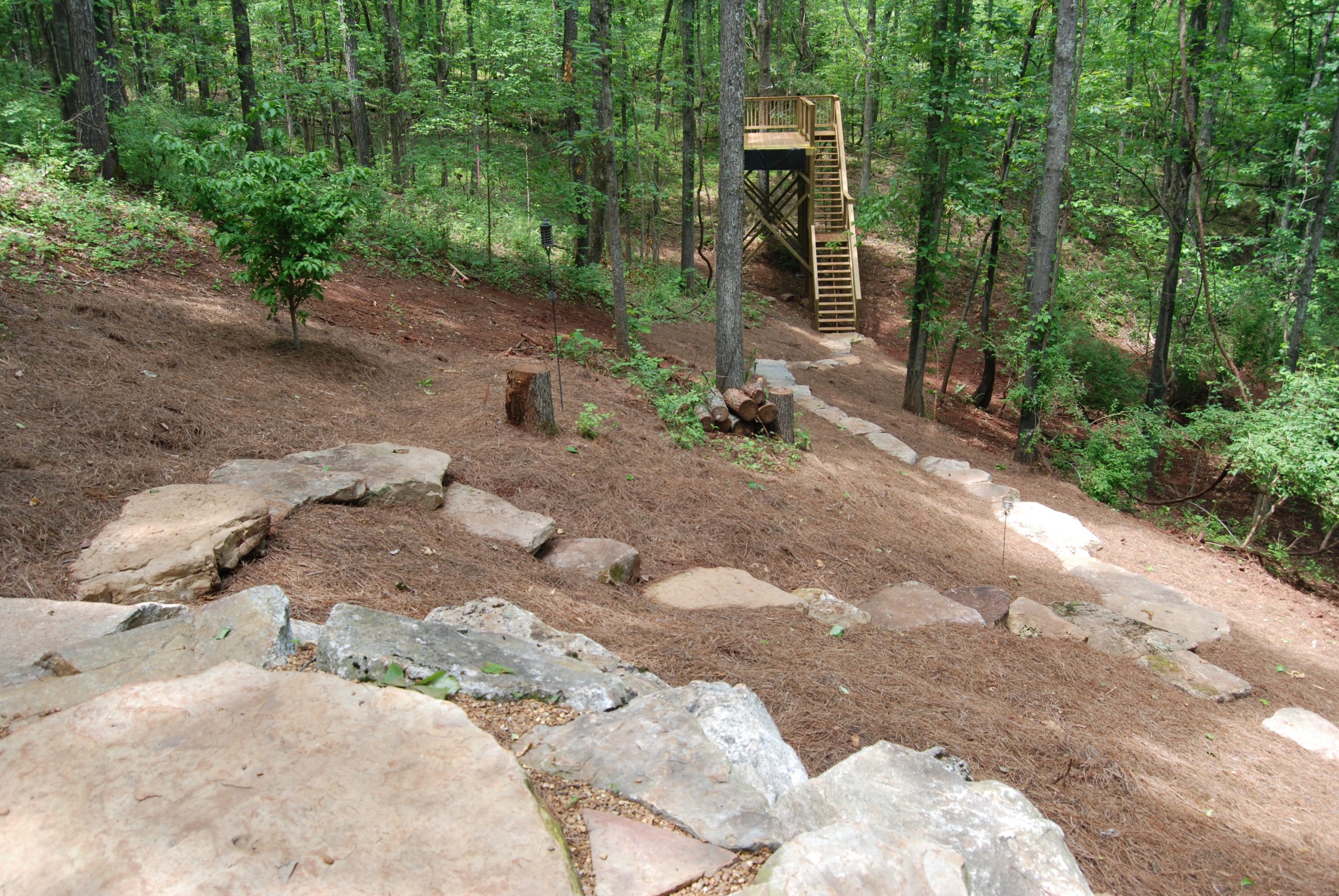 Boulders set into a graded slope